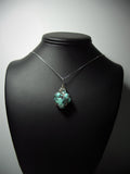 Turquoise Nugget Pendant Wire Wrapped .925 Sterling Silver display - Jemel