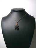 Raw Apache Tear Pendant Wire Wrapped Bronze display - Jemel