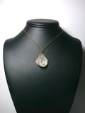 Calcite Crystal Pendant Wire Wrapped Bronze display - Jemel