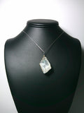 Calcite Crystal Pendant Wire Wrapped .925 Sterling Silver display - Jemel