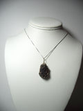 Raw Magnetite Pendant Wire Wrapped .925 Sterling Silver display - Jemel