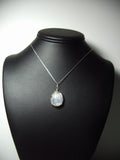 Blue Moonstone Cabochon Pendant Wire Wrapped .925 Sterling Silver display - Jemel