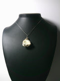 Raw Scolecite Crystal Pendant Wire Wrapped .925 Sterling Silver display - Jemel