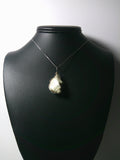 Raw Thomsonite Crystal Pendant Wire Wrapped .925 Sterling Silver display - Jemel