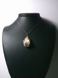 Thomsonite Nugget Pendant Wire Wrapped .925 Sterling Silver display - Jemel
