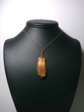 Golden and Red Variegated Tiger's-Eye Pendant Wire Wrapped Bronze display - Jemel