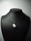 Calcite Crystal Pendant Wire Wrapped .925 Sterling Silver display - Jemel