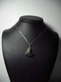 Raw Magnetite Pendant Wire Wrapped .925 Sterling Silver display - Jemel