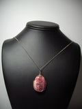 Rhodochrosite Cabochon Pendant Wire Wrapped 14/20 Gold Filled display - Jemel