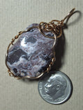 Raging River Rhyolite Pendant Wire Wrapped Bronze