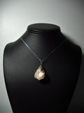 Raw Stilbite Crystal Pendant Wire Wrapped .925 Sterling Silver display - Jemel