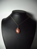 Sunstone Cabochon Pendant Wire Wrapped 14/20 Gold Filled display - Jemel