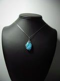 Sleeping Beauty Turquoise Pendant Wire Wrapped .925 Sterling Silver display - Jemel
